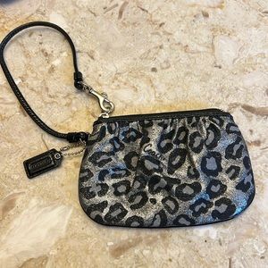 Coach wristlet in metallic leopard print